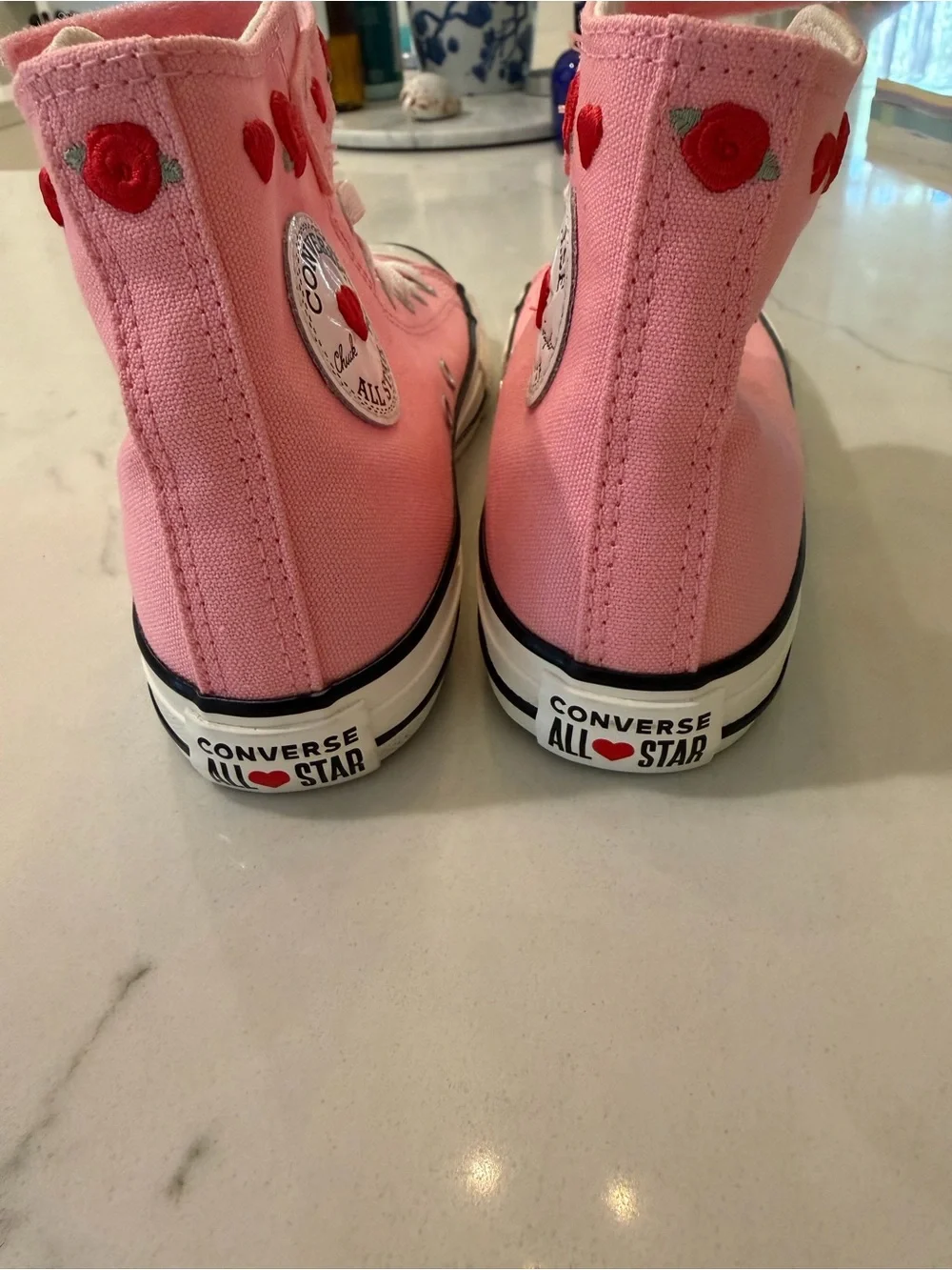 Converse Pink High-Top Sneakers with Red Heart Details